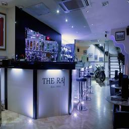 The Raj Restaurant logo