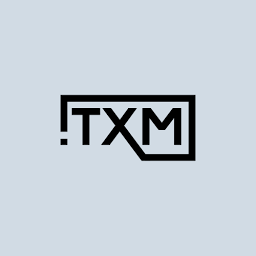 TXM - The Xtra Mile logo